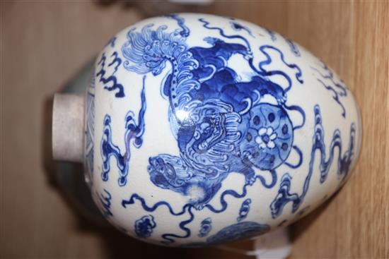 A Chinese blue and white lion-dog jar, Kangxi mark but late 19th century and a 19th century blue and white jar tallest 17cm, lacking